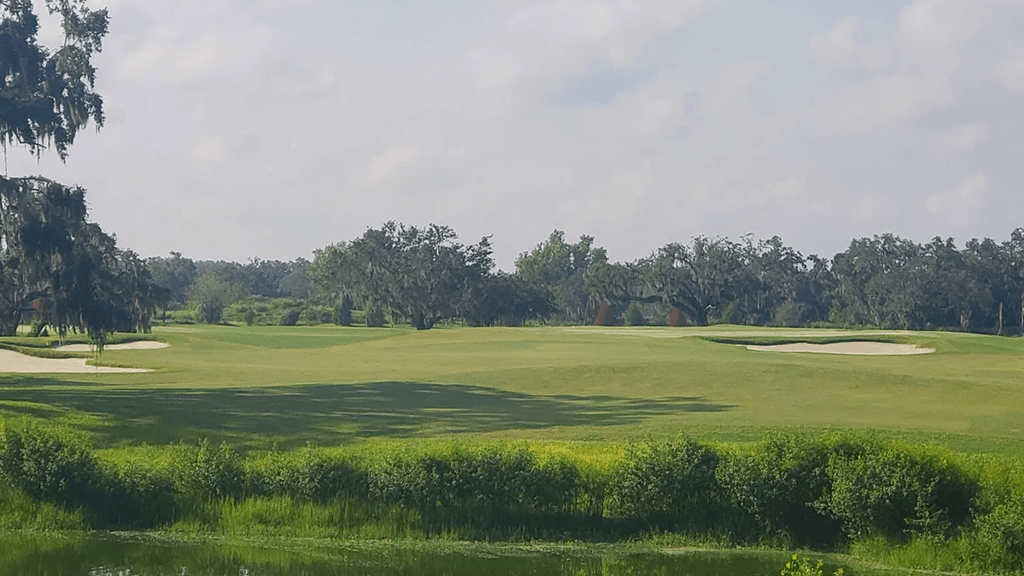 Golf course green with bunkers